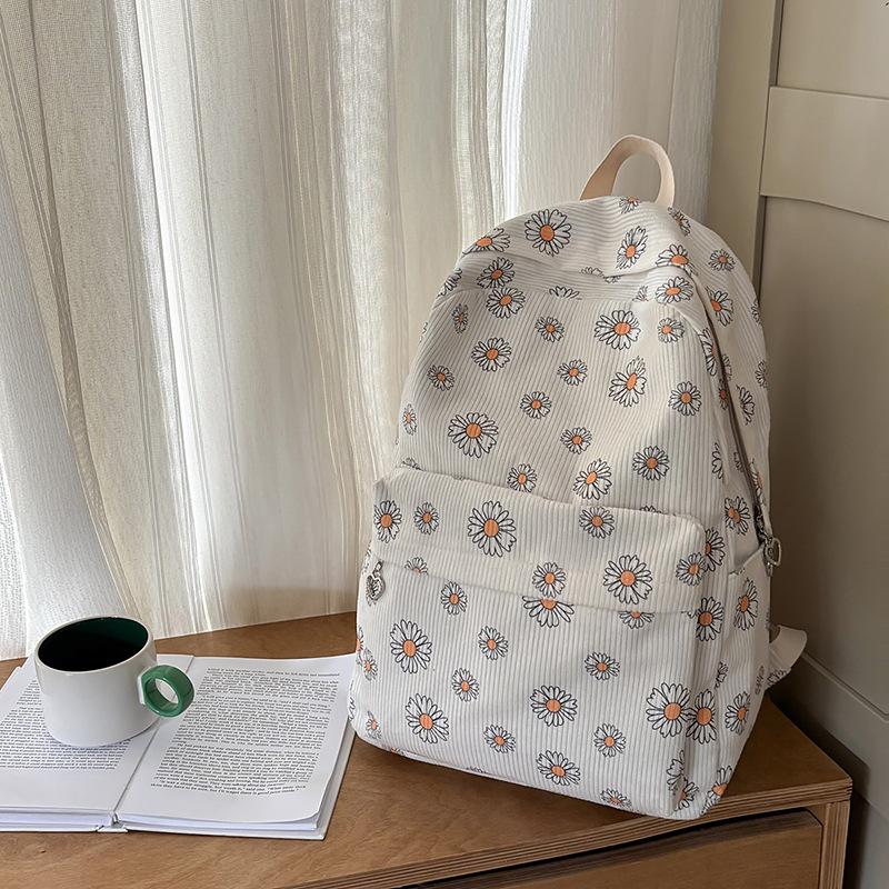 School bag female ins Japanese girls college wind small floral backpack Korean version Harajuku printed middle school student backpack female