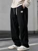 Pantaloni casual largi pentru bărbați, din catifea reiată neagră, cu șnur și patch cu logo lateral - Croială lejeră, Streetwear