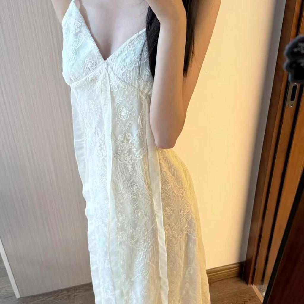 Summer women's new sexy suspender dress women's jacquard waist, hip wrap and thin holiday style mid-length dress