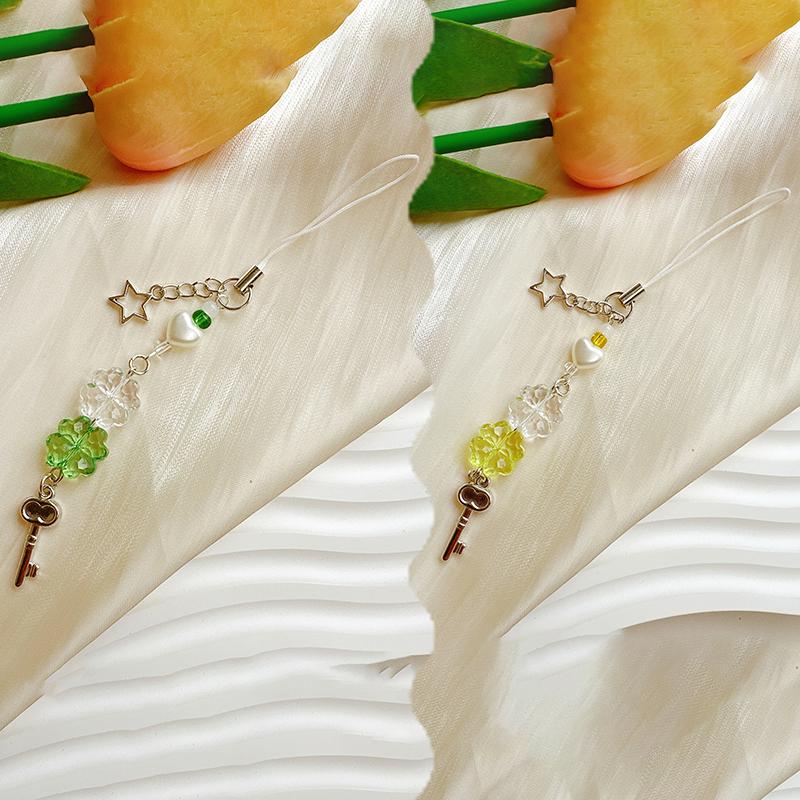 Süßer vierblättriger Kleeblatt-Handyanhänger mit Perlen für Frauen und Mädchen, süßer, exquisiter Schlüsselanhänger, modisches Handy-Lanyard-Geschenk
