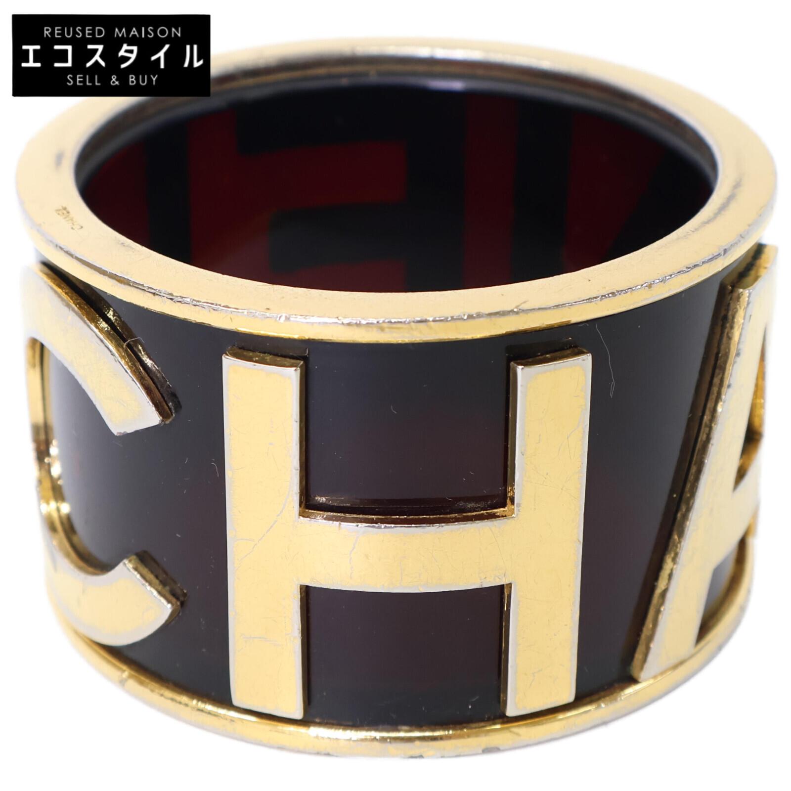

CHANEL Logo bangle Bangle Dark brown / goldUsed