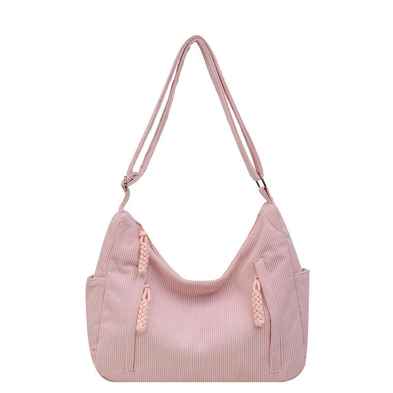 

The New Large-capacity Handbag for Autumn and Winter Features A Fashionable Striped and Wavy Pattern 37*25*10 рожевий