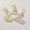 Radiant Bow Perfume Bottle Keychain & Elegant Bag Pendant Gift