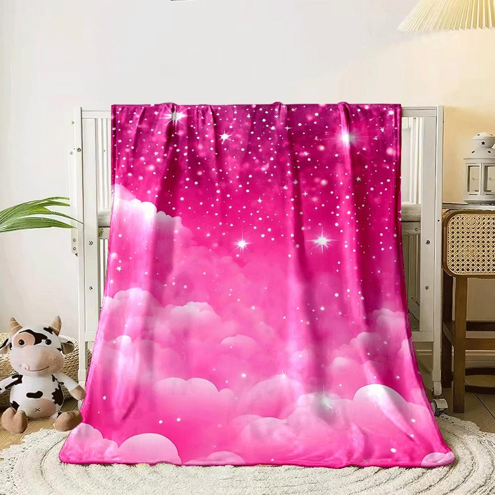 A vibrant pink sky with glowing stars and fluffy clouds. for all seasons blanket lunch break throw gift 80cm x 120cm