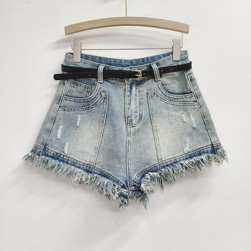 Summer new Korean version design sense fringed rough edge ripped hole Spice girl retro hot pants high waist denim shorts women S светло-синий