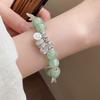 Silver Four Leaf Clover Charm Bracelet with Round Beads Adjustable Chain Link Design for Everyday Wear and Special Occasions Jewelry Accessory
