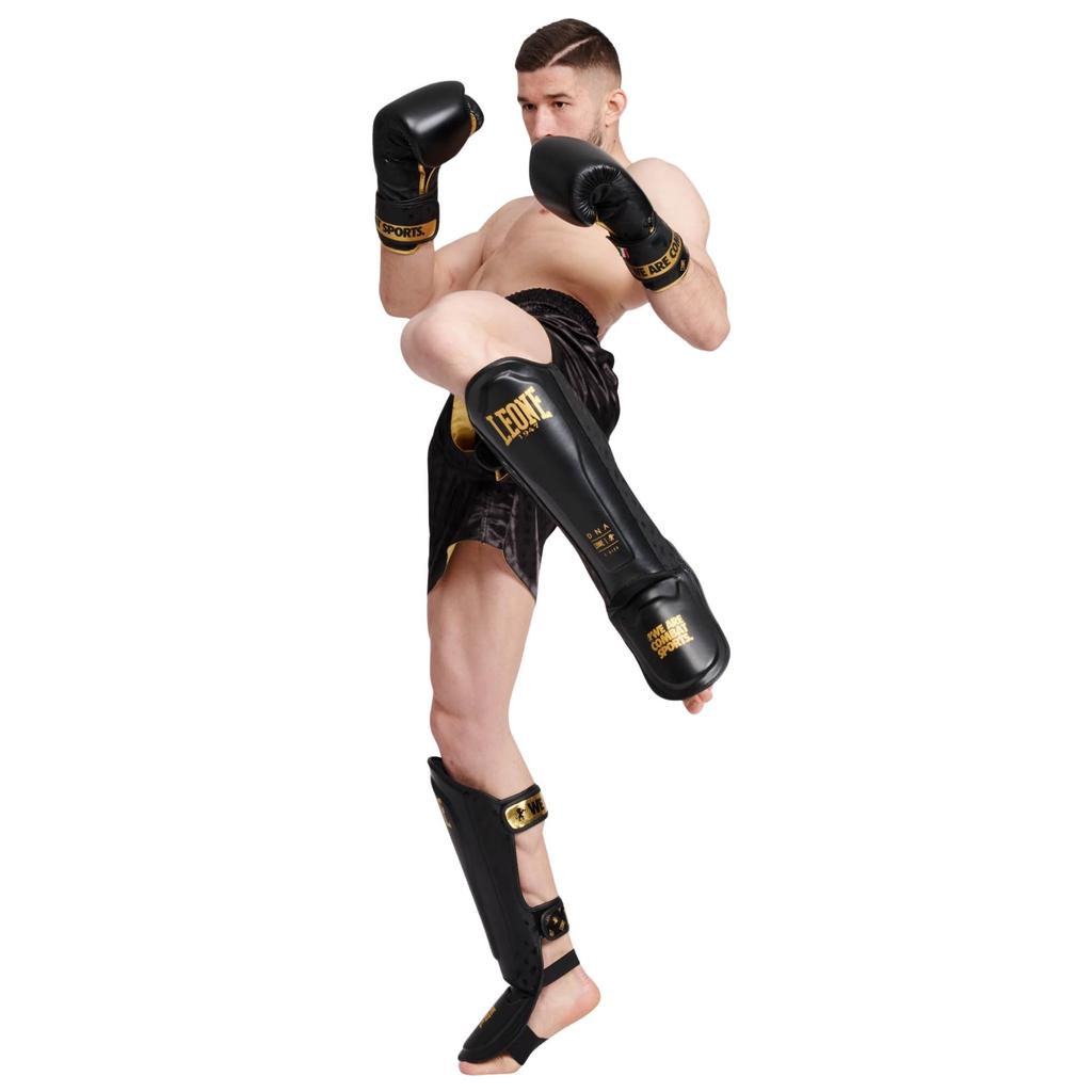 LEONE 1947 Bojové sporty Kickbox MMA Chrániče holení Unisex FULL chrániče nohou s EVA gelovými vložkami M PT177 [DNA PROTECTION] & Velikost/Černá [Originální]