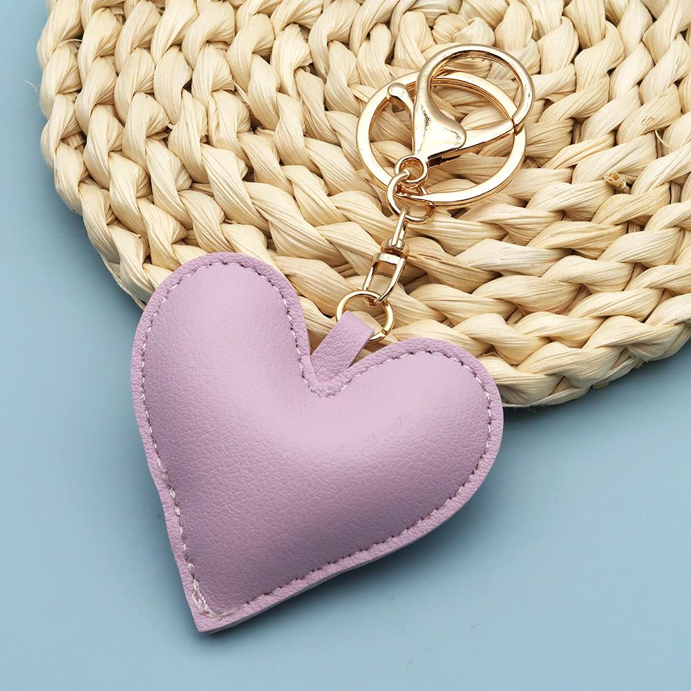 Spot wholesale PU simple peach heart bag pendant Xiaohongshu explosive love couple pendant keychain bag lanyard