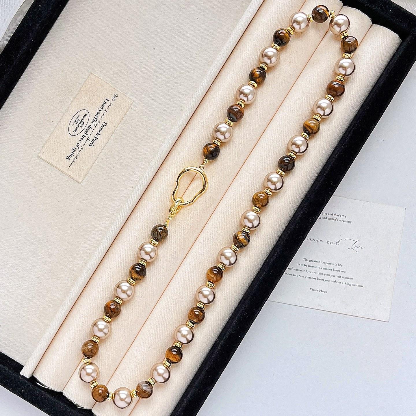 

10Mm Autumn And Winter Retro Boutique Natural Tiger S Eye Stone Shijia Pearl Design Sense Necklace Collarbone Chain Sweater Chain Women