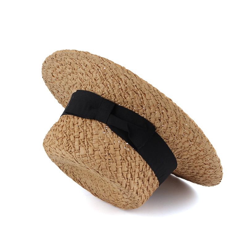 New spring and summer women's hand-woven straw hat simple casual hat British fashion top hat flat top sun hat