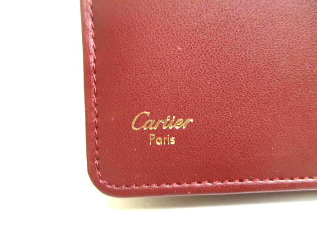 Оригинальный кошелек Cartier Must de Cartier из бордовой кожи, бифолд, длинный #a741 Восстановленный