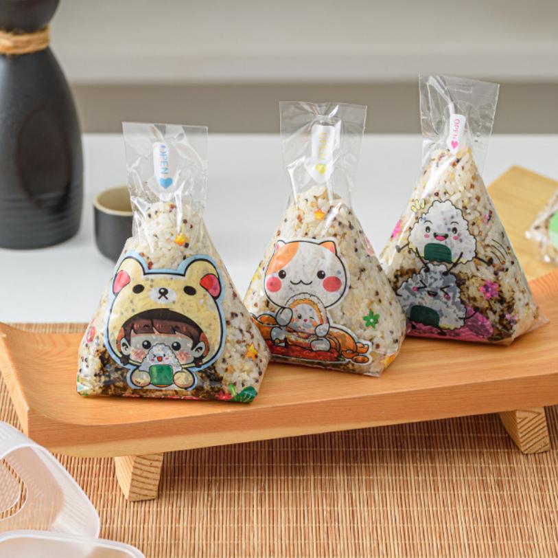 50/100 stuks Mooie Cartoon Driehoek Rijstbal Verpakkingszak Zeewier Onigiri Sushi Bento Maakvorm Bento Accessoires Sushi Zakjes