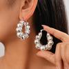 Metal light-sensitive surface geometric round U-shaped ear buckle niche environmentally friendly fashion earrings