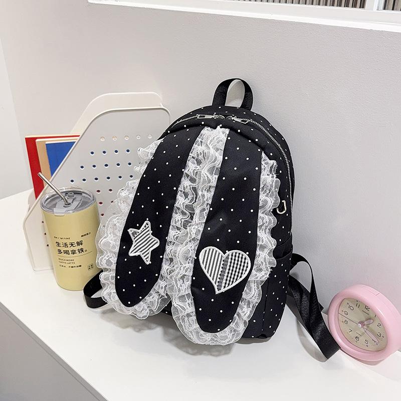 Schoolbag Korean version of sweet girl polka dot lace backpack new lop-eared rabbit trend high value travel foreign style backpack