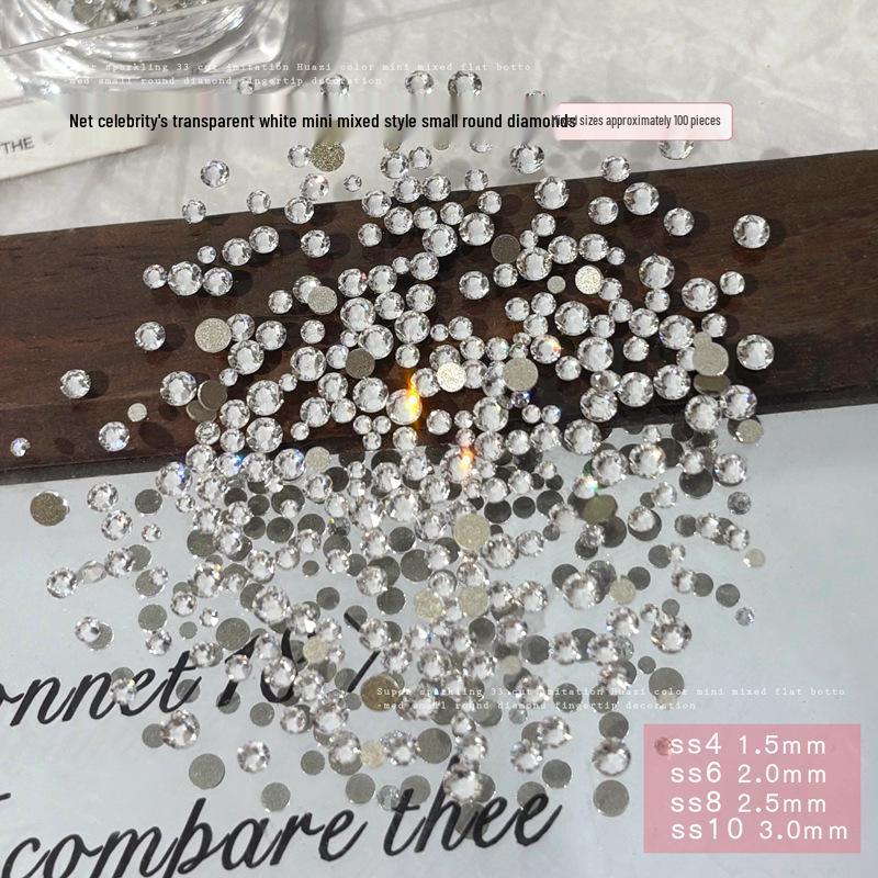 33-Piece Colorful Nail Art Rhinestones: Super Sparkle Flat Back Mini Round Gems in Mixed Sizes.