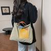 ins niche design splicing canvas bag Korean version women's shoulder bag commuter tote bag versatile casual messenger bag
