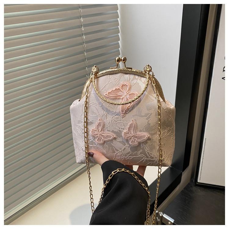 Borsa da sera ricamata eterea con dettagli in perle per serate alla moda