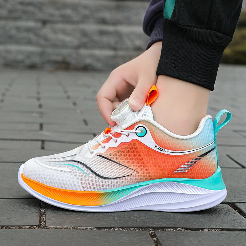 Boys' shoes spring and summer 2025 new mesh breathable non-slip children's sports shoes medium and older children's rotating button classmates