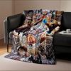 Dynamic action scene featuring characters attacking with power and force. for all seasons blanket lunch break throw gift