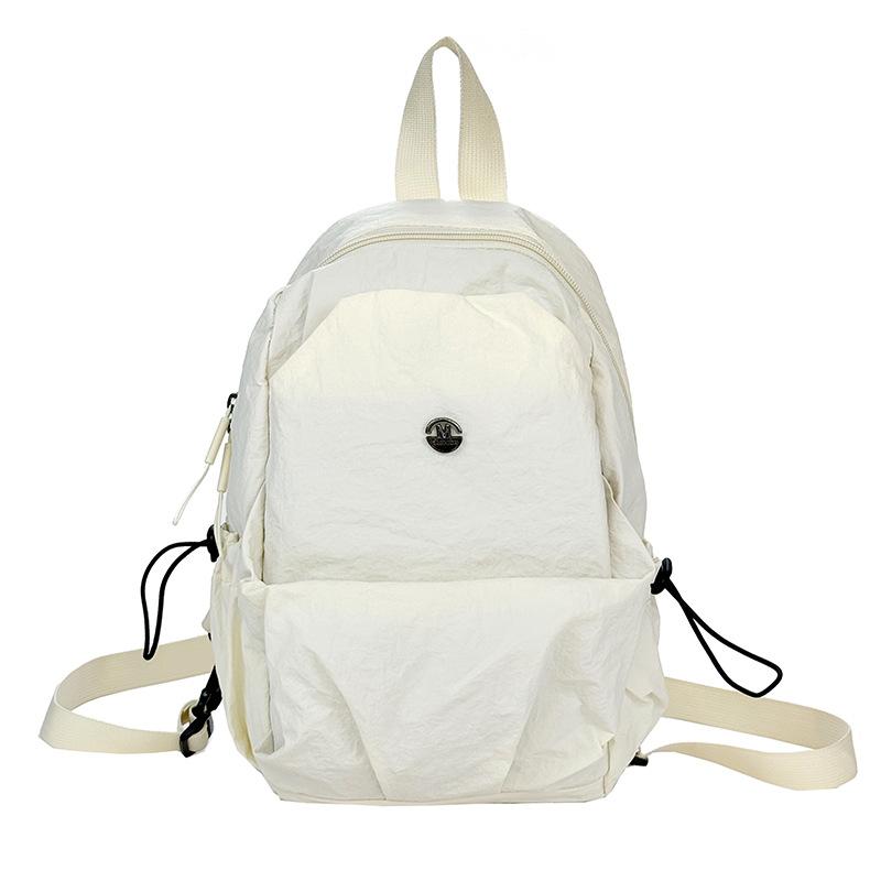 Schoolbag new solid color lightweight small backpack women's simple large capacity breast bag leisure travel commuting versatile portable small 