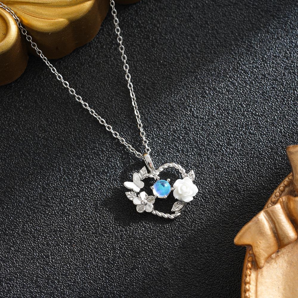 European Luxury Heart & Flower Titanium Steel Necklace - Stylish, High-End, Colorfast Clavicle Chain for Women.