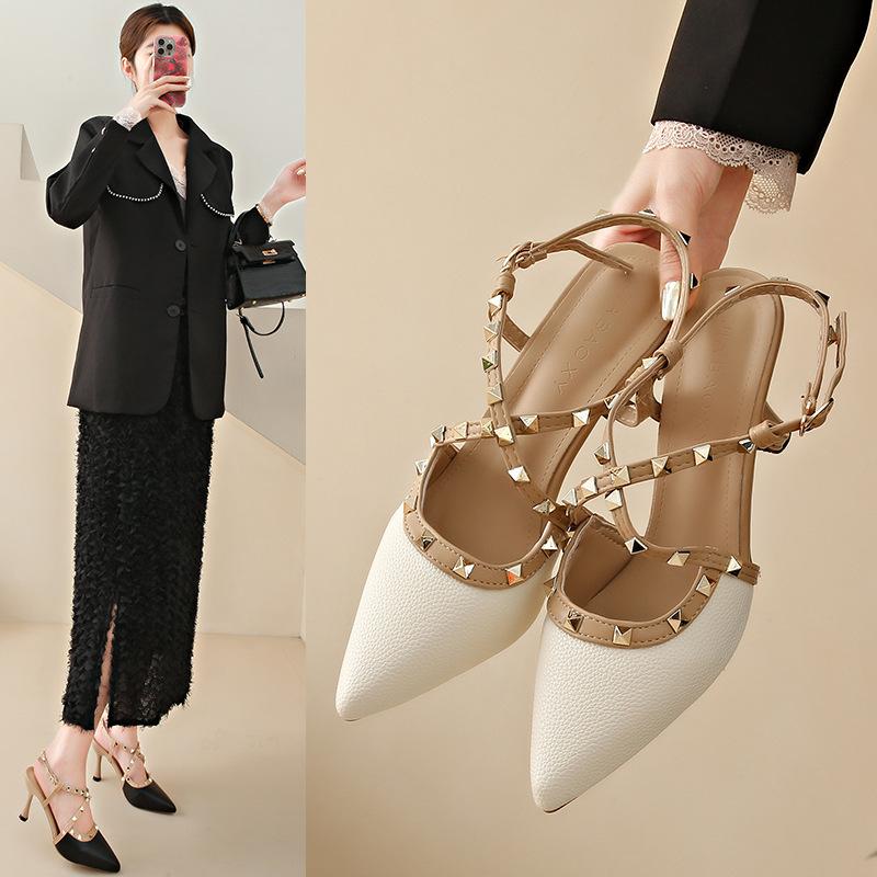 Summer 2025 new mid-heel nude high heels French niche thick heel pointed head rivet bag head empty sandals women