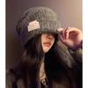 The New Woolen Hat Shows Off Your Face. It's A Trendy Knitted Hat with A Fabric Patch for Warmth Ear Protectors and Headscarves