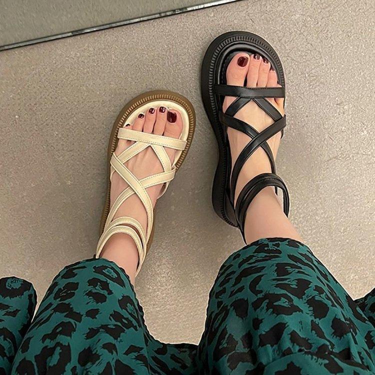 Sandales semelle muffin été nouvelle semelle épaisse rehaussement design creux sensation lanières croisées chaussures romaines bottes cool