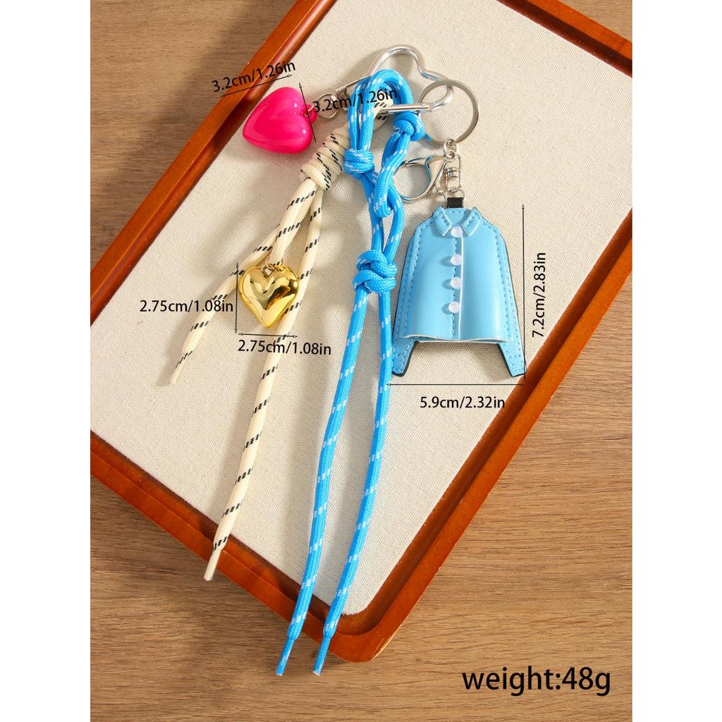 It is the same niche design PU blue shirt pendant keychain love braided rope versatile bag pendant accessories.