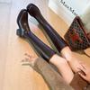 In the autumn and winter of 2025, the new thick high-heeled thick-heeled casual versatile elastic thin boots are flat but knee-length boots.