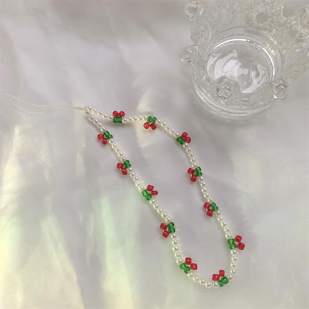 Bracelet de perles d'amour pour femmes, petit nœud en cristal frais, fleurs, amour, chaîne de téléphone portable, anti-chute, accessoires de coque de téléphone portable, DIY