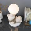 Modern minimalist decorative table lamp with a bear