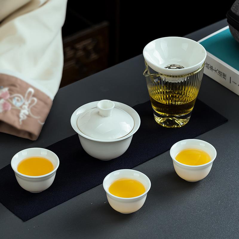 Dehua white porcelain travel kung fu tea set portable bag one bowl three cups glass express cup gifts can be done