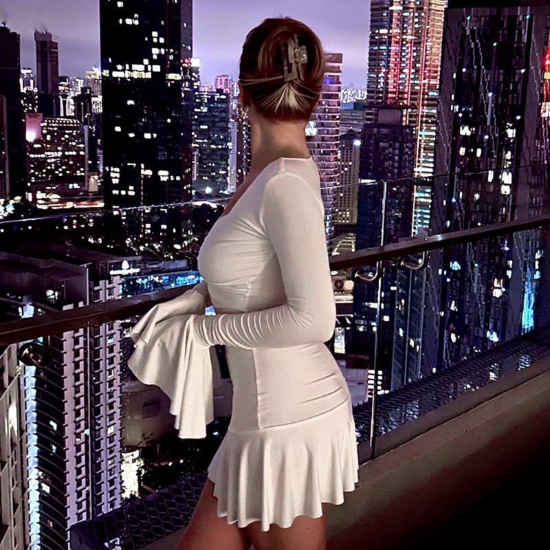 Women's Autumn and Winter Solid Color Low Neck Sexy Long Sleeve Ruffle Dresses