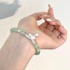 Retro Jade Bow Bell Bracelet: High-End Niche Fashion Jewelry