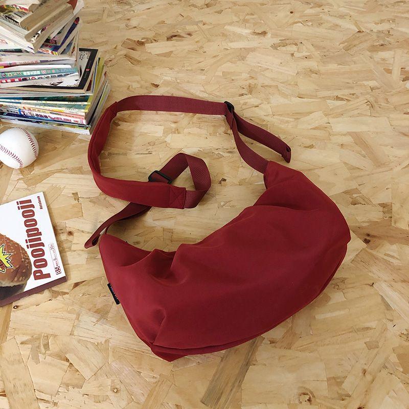 

Korean Style Idle Style Summer Large Capacity Work Work Clothing Dumpling Bag Female 2025 Red New Style Crossbody Canvas Bag Red Dumpling Bag