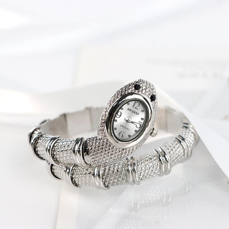 

Женские кварцевые часы Змеиные часы Браслет из нержавеющей стали Наручные часы Ювелирные изделия Подарки