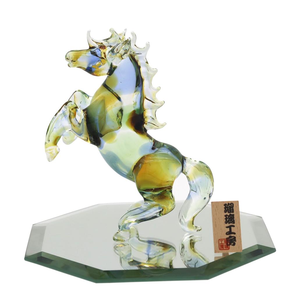 Glass Square Good Luck Charm: A Large, Standing Glass Horse Symbolizing Vitality, Drive, and Energy To Enhance Success. Available In Three Colors, 15c