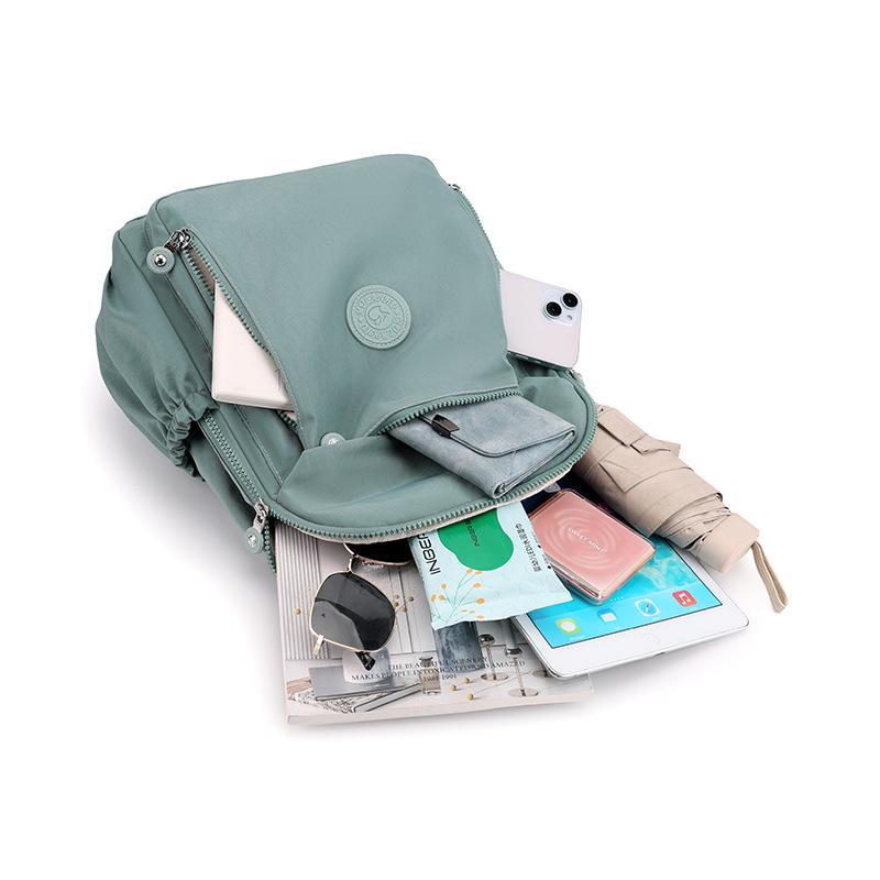 Commuter Double Shoulder Bag: Large Capacity Casual Nylon Backpack, Korean Style, Lightweight and Versatile.
