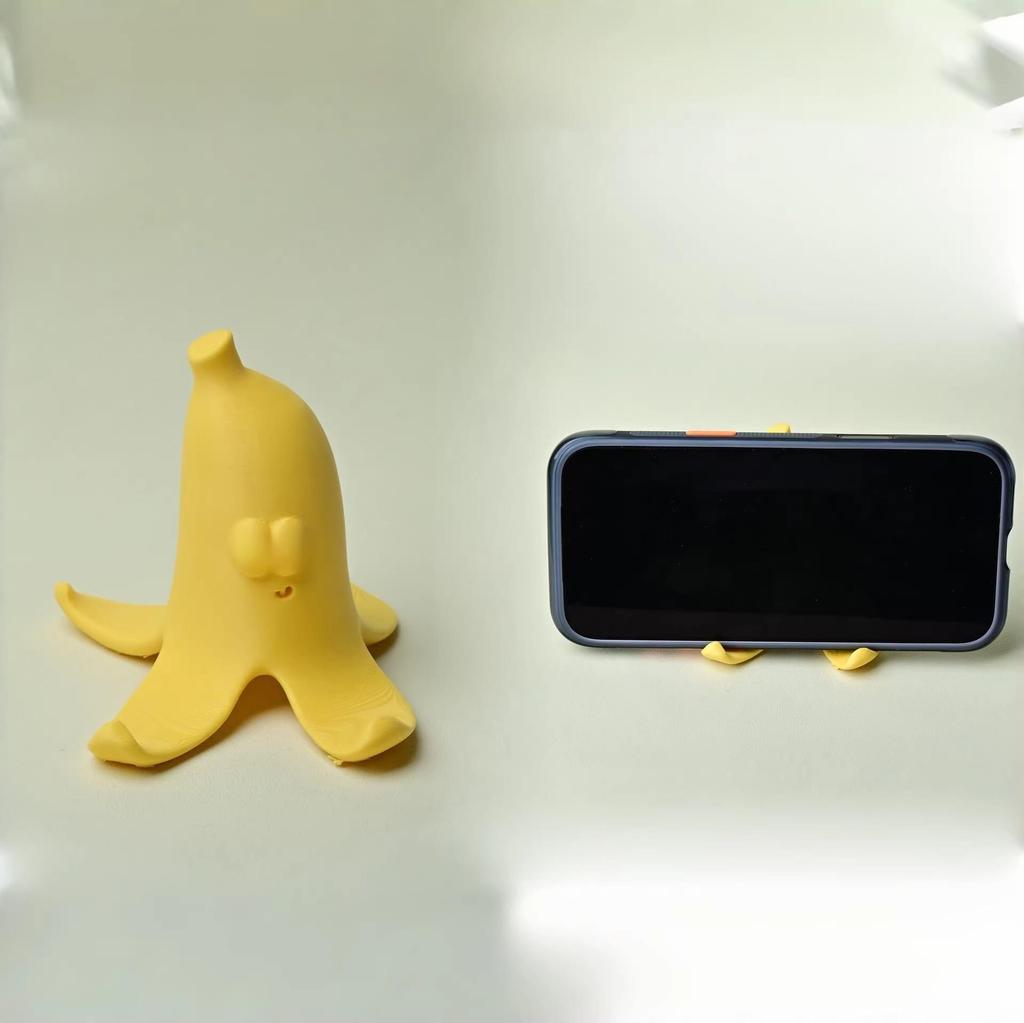 3D Printed Smiley Face Banana Phone Holder - Creative Desktop Prank Ornament