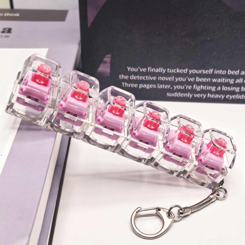 Stummer mechanischer Tastatur-Schlüsselanhänger mit 5,6 Kreuzachsen-Tasten und hochtransparenten Tastenkappen; Dekompression Spielzeug.