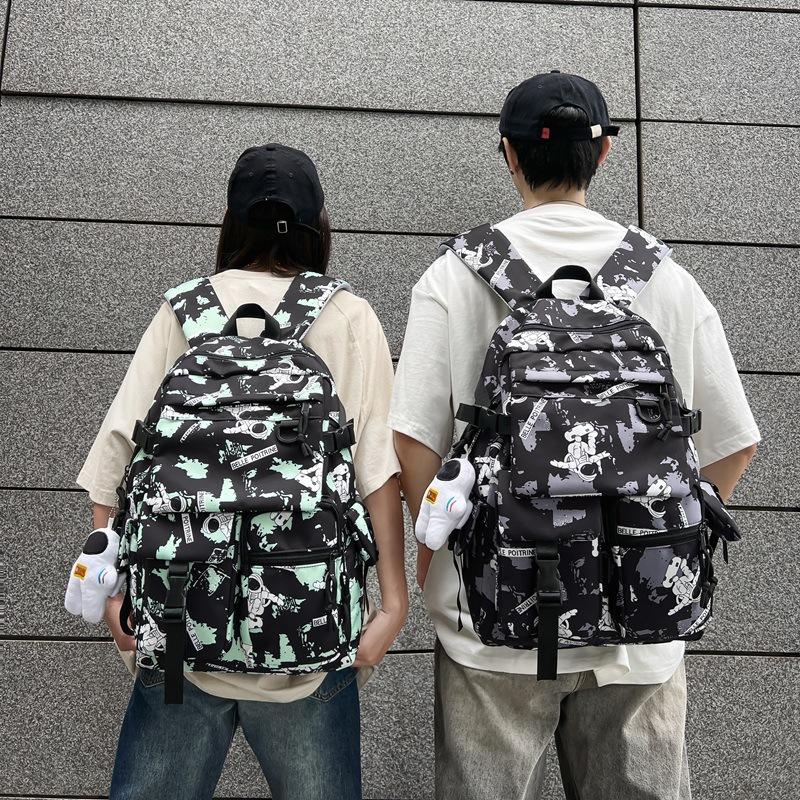School bag large capacity multi-compartment tide cool junior high school students design sense versatile personality graffiti back