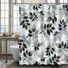 Light blue and black leaf patterned shower curtain, polyester fabric, with hooks, machine washable, suitable for bathroom decor.