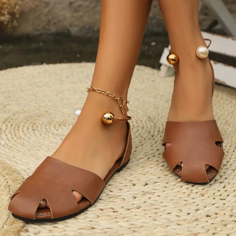 

Мода 2024 года, высококачественная женская обувь, летние хиты продаж, модные однотонные женские сандалии Baotou Hollow Pearl Flat Bottom Roman 43 светло-коричневого