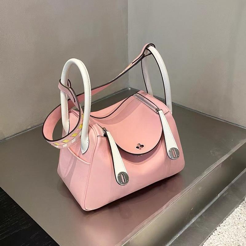 

25 New Genuine Leather Women s Bag Swift Head Layer Cowhide Color Blocked Weaving Medicine Box Lindi Bag Single Shoulder Handheld Cross Border Batch 26x12x18cm рожевий
