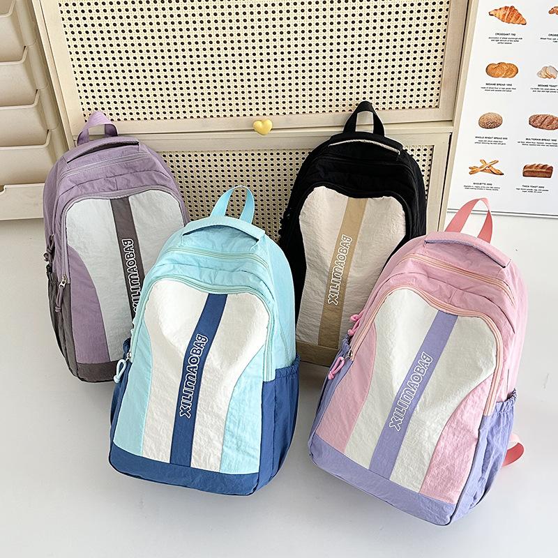 New small fresh and fashionable backpack simple youth campus junior high school student schoolbag large capacity travel backpack
