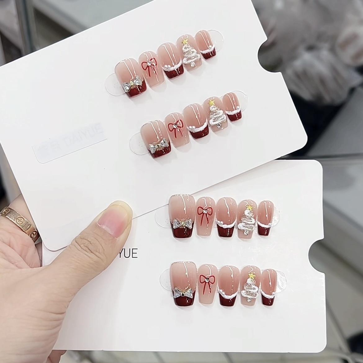 

Чистая ручная работа Фототерапия Носимая броня Рождественский бант Готовый продукт Многоразовые накладные ногти large L