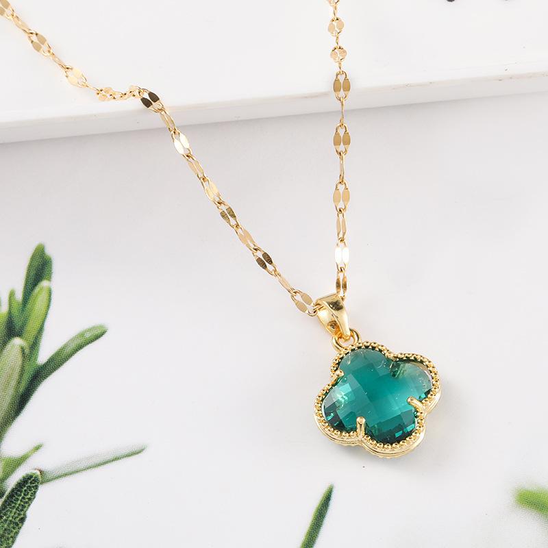 Collier en acier titane Collier trèfle à quatre feuilles Chaîne de clavicule rouge en filet Cadeau Pendentif double face en herbe porte-bonheur Bijoux en cristal Collier pour femme