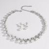 Elegant Pearl Necklace and Earrings Set: Versatile Four-Piece Wedding Jewelry with Tassel and Clavicle Chain