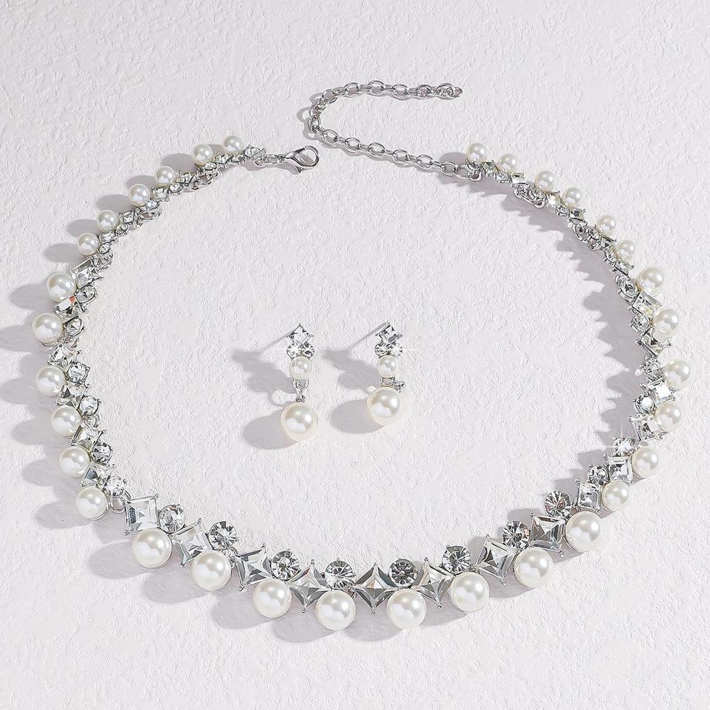 Elegant Pearl Necklace and Earrings Set: Versatile Four-Piece Wedding Jewelry with Tassel and Clavicle Chain